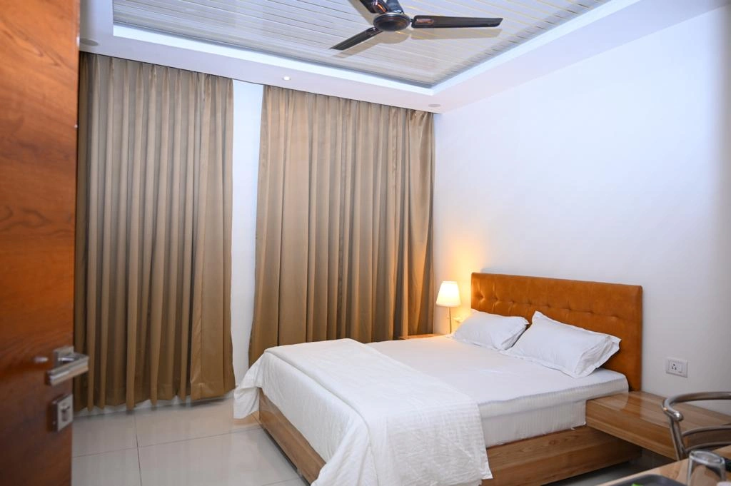 Spacious Super Deluxe Room at Hotel Hibiscus Tree